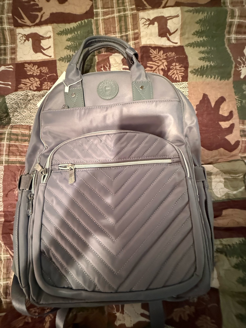 Newbella’s Quilted Fabric Gray Backpack